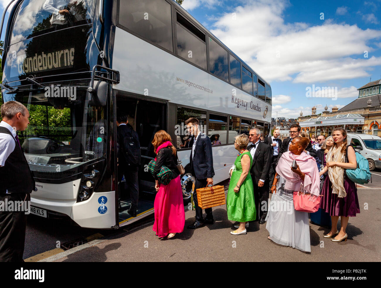 Opera Fans Arrive In The Sussex Town Of Lewes En Route To The Nearby Glyndebourne Opera House, Lewes, Sussex, UK Stock Photo
