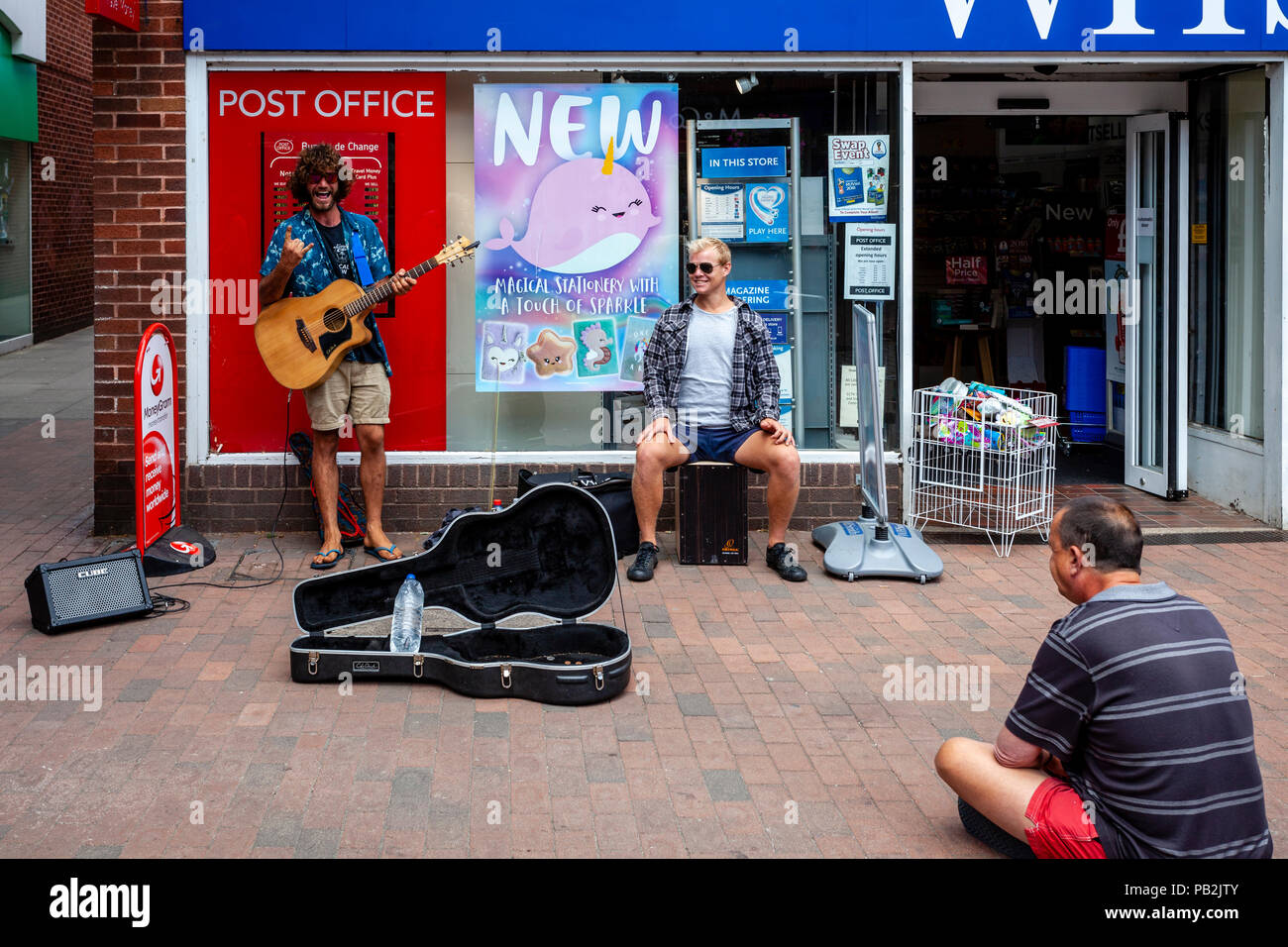 A Street Musician Playing In The High Street, Lewes, Sussex, UK Stock Photo