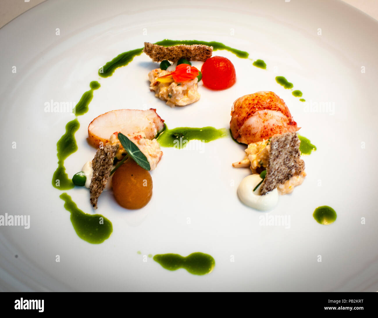 Dinner Dish in Hotel Lenkerhof. Canadian lobster, salicornes, crème fraȋche Stock Photo