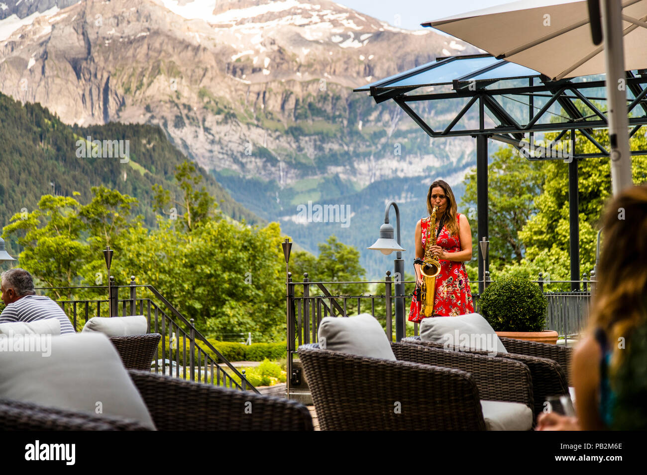Hotel Lenkerhof, Lenk, Switzerland. In the afternoon on the terrace and in the evening in the lobby the music does not come from the loudspeaker, but is adapted live to the liking of the guests Stock Photo