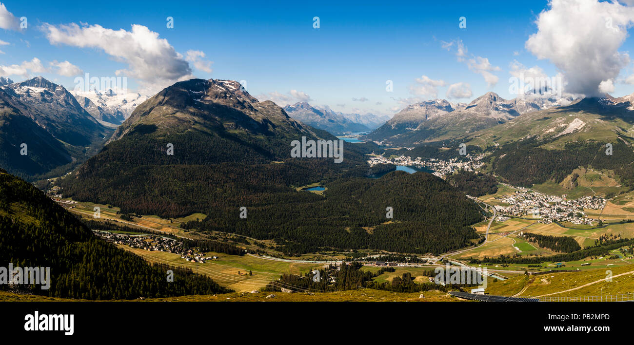 View from the top station of Muottas Muragl: Down in the valley on the left is Pontresina, where German Chancellor Angela Merkel regularly recuperates. In the valley to the right, lined up along the lakes, are the towns of Celerina, St. Moritz and, in the background, Silvaplana Stock Photo