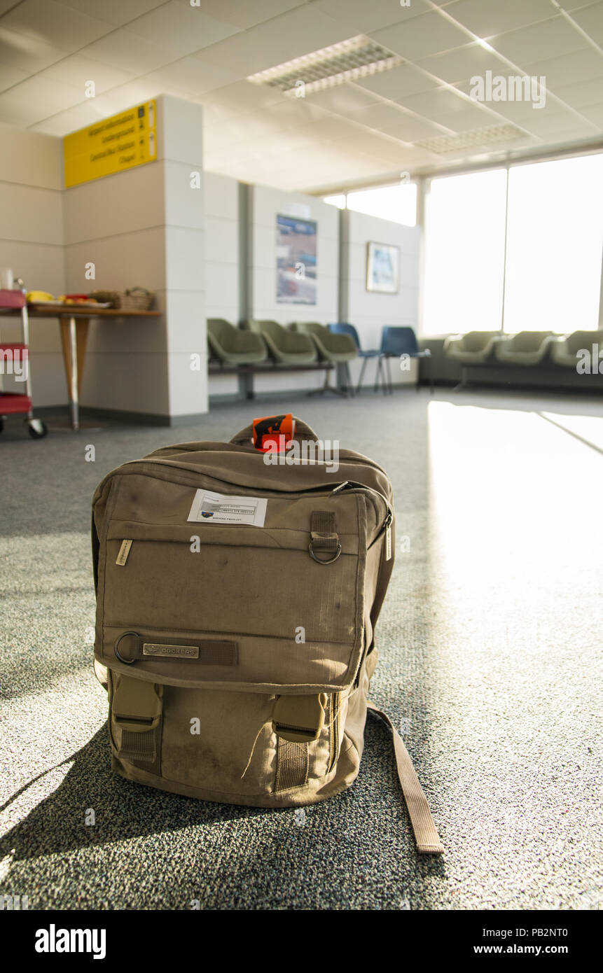 An image of an unattended rucksack / backpack / case at an airport Stock Photo