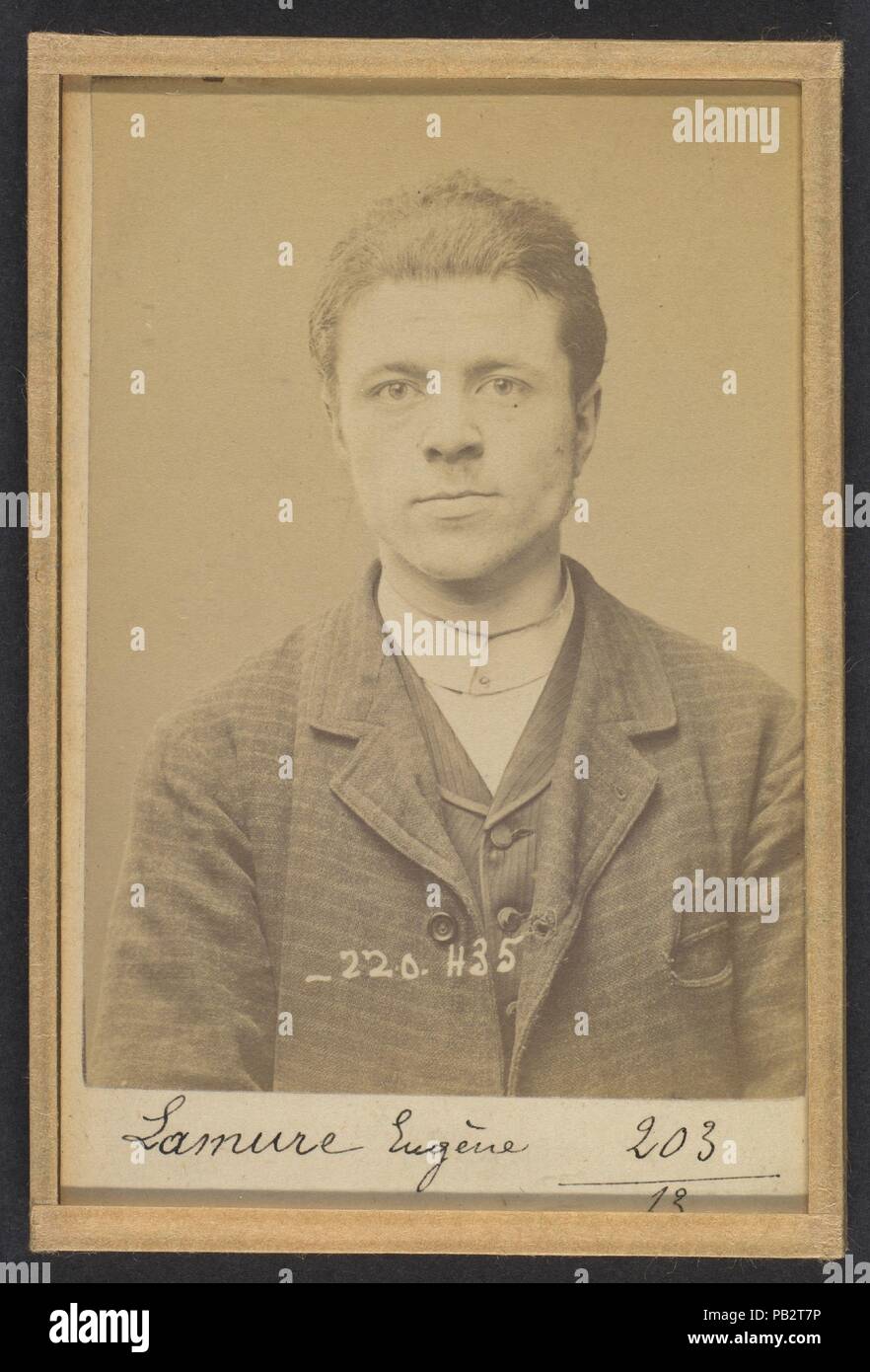 Lamure. Eugène, Clément. 20 ans, né le 5/11/73 à Paris Ier. Gérant de magasin. Anarchiste. 2/7/94. Artist: Alphonse Bertillon (French, 1853-1914). Dimensions: 10.5 x 7 x 0.5 cm (4 1/8 x 2 3/4 x 3/16 in.) each. Date: 1894.  Born into a distinguished family of scientists and statisticians, Bertillon began his career as a clerk in the Identification Bureau of the Paris Prefecture of Police in 1879. Tasked with maintaining reliable police records of offenders, he developed the first modern system of criminal identification. The system, which became known as Bertillonage, had three components: anth Stock Photo