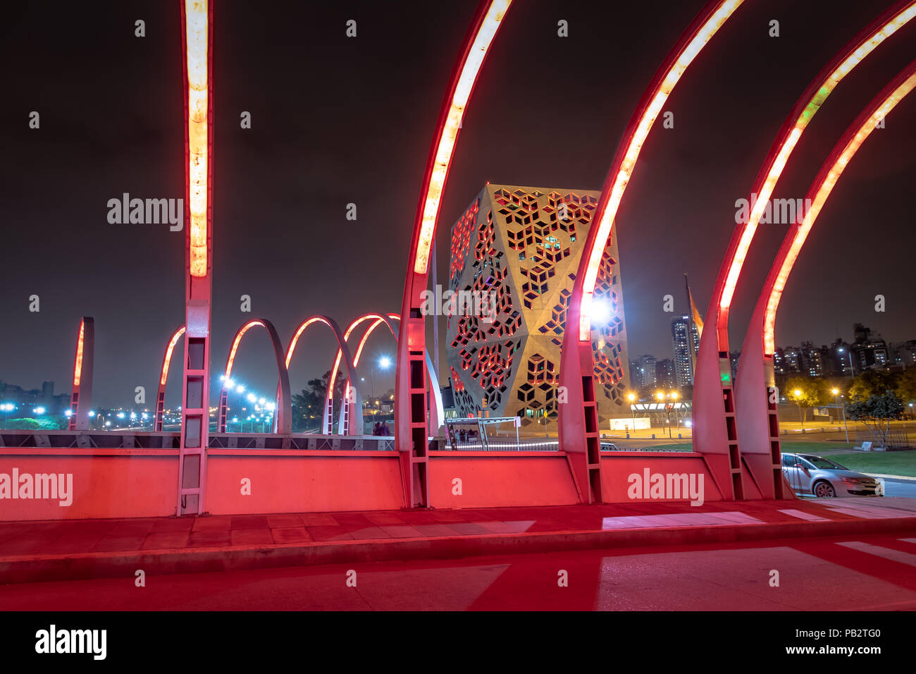 Puente del Bicentenario (Bicentenary Bridge) at night with Centro