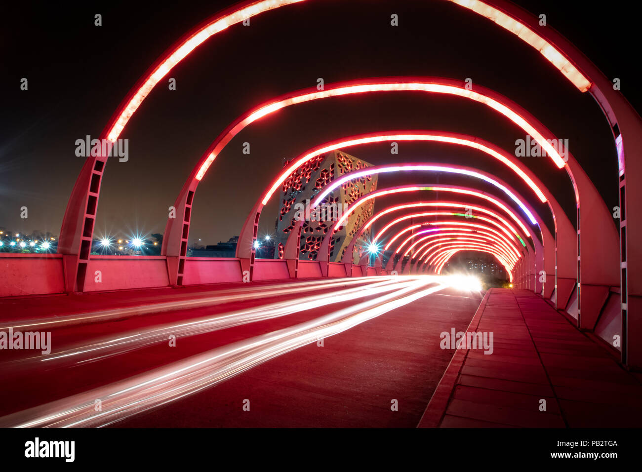Puente del Bicentenario (Bicentenary Bridge) at night with Centro
