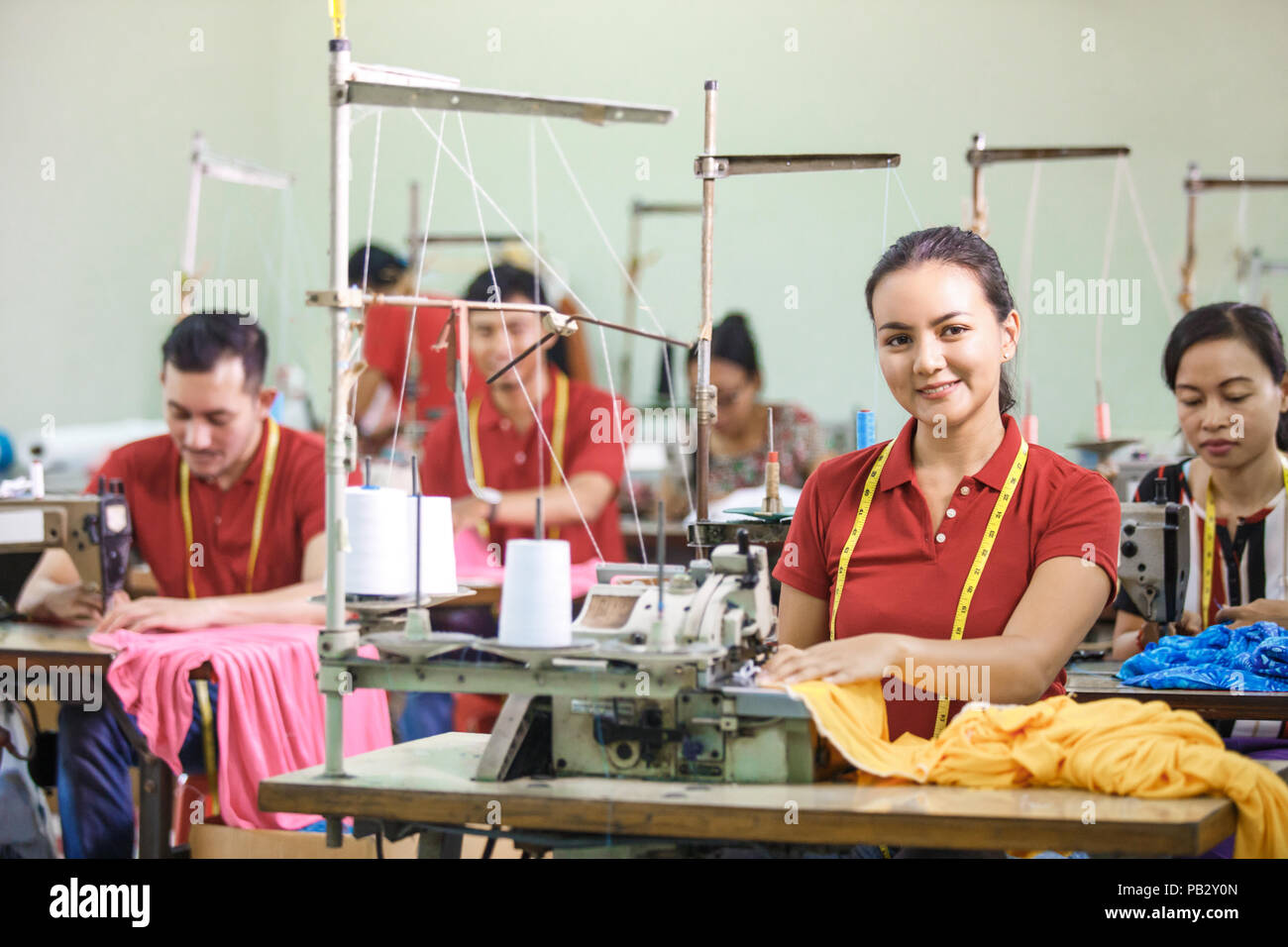 asian workers in garment factory sewing with industrial sewing m Stock ...