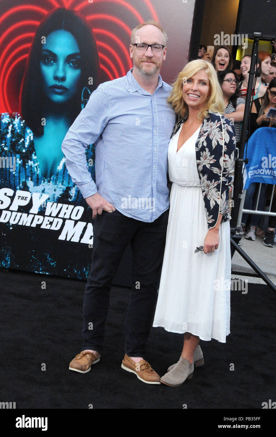 LOS ANGELES, CA - JULY 25: Actor Matt Walsh and wife Morgan Walsh attend the World Premiere of Lionsgate's' 'The Spy Who Dumped Me' on July 25, 2018 at Fox Village Theatre in Los Angeles, California. Photo by Barry King/Alamy Live News Stock Photo