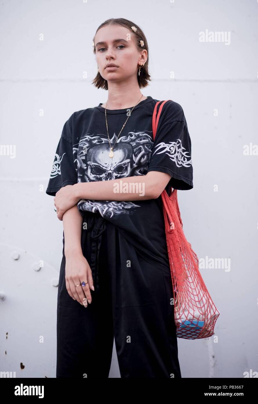 Helsinki, Finland. 24th July, 2018. A chic showgoer posing outside during Helsinki Fashion Week - July 24, 2018 - Credit: Runway Manhattan | usage worldwide/dpa/Alamy Live News Stock Photo