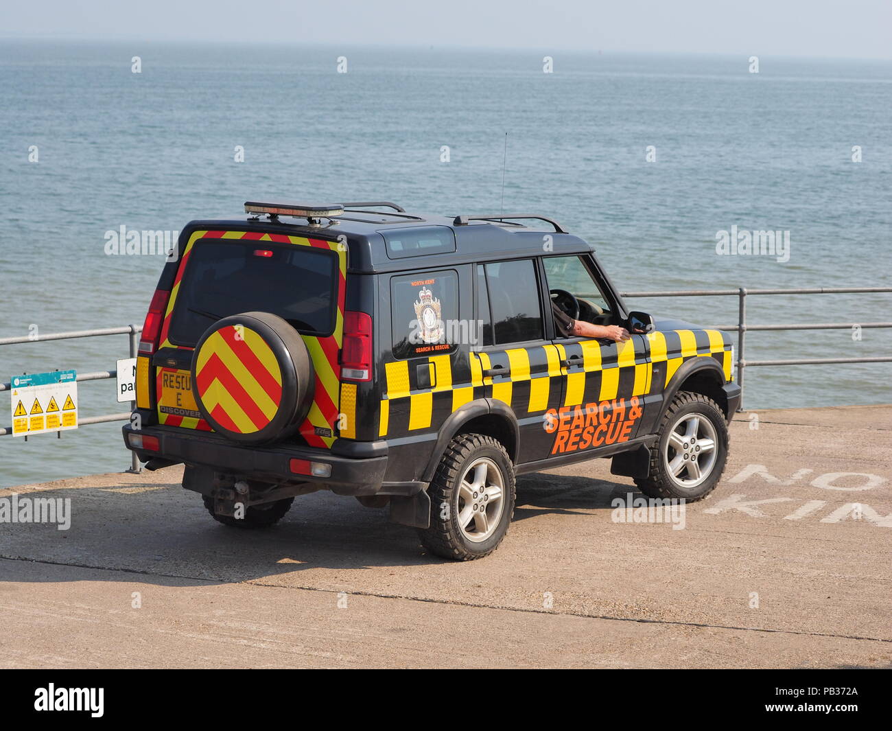 Sheerness, Kent, UK. 26th July, 2018. UK Weather: hot and humid morning in Sheerness, Kent. A patrol vehicle from the voluntary North Kent Search & Rescue organisation surveys the seafront. Credit: James Bell/Alamy Live News Stock Photo