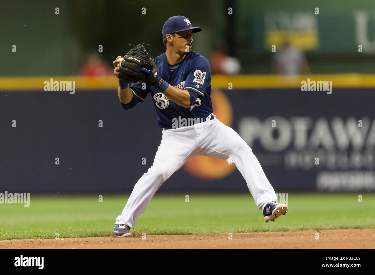 Milwaukee, WI, USA. 24th July, 2018. Milwaukee Brewers second baseman Tyler Saladino #13 in action during the Major League Baseball game between the Milwaukee Brewers and the Washington Nationals at Miller Park in Milwaukee, WI. John Fisher/CSM/Alamy Live News Stock Photo