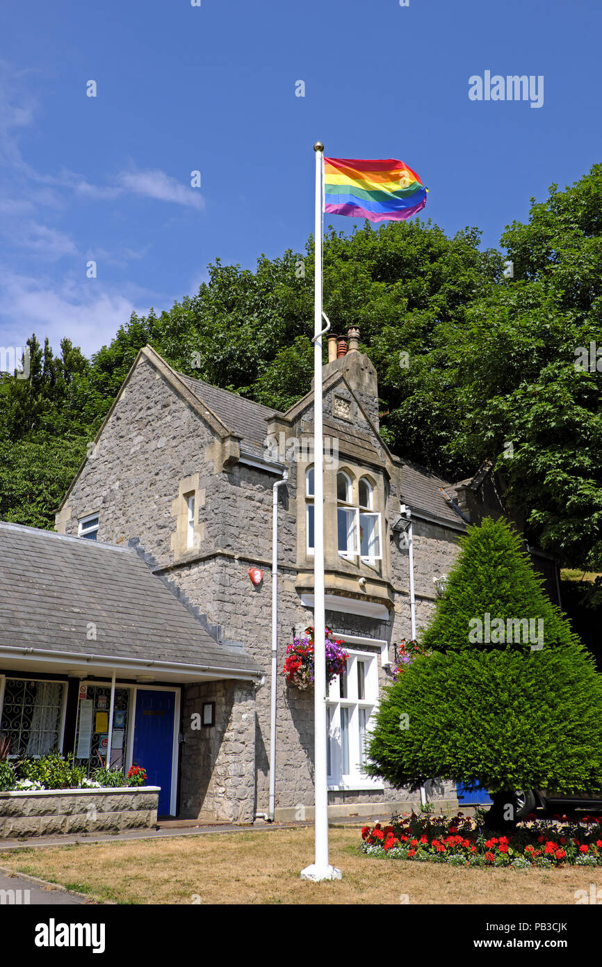 Weston-super-Mare, UK. 26th July, 2018. The Pride flag flies over Grove House, the headquarters of Weston-super-Mare Town Council, ahead of the annual Weston-super-Mare Pride event. This year’s event takes place in Grove Park in the town centre on 28th and 29th July. Keith Ramsey/Alamy Live News Stock Photo