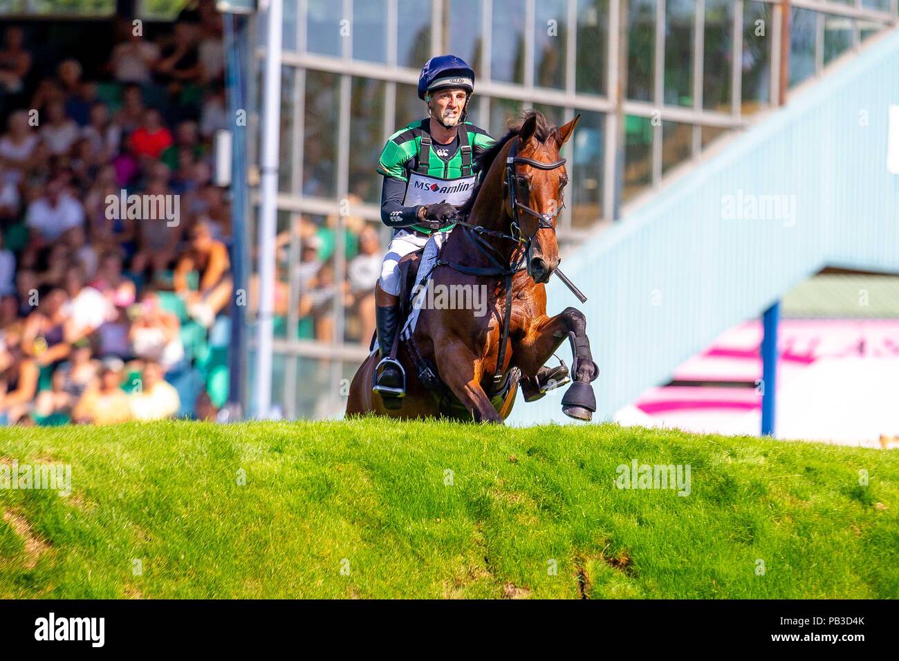 Hickstead, Sussex, UK. 26th July 2018. 6th Place. Tom Jackson riding Billy Cuckoo. GBR.  The MS Amlin Eventers Challenge. Longines FEI Jumping Nations Cup of Great Britain at the BHS Royal International Horse Show. All England Jumping Course. Hickstead. Great Britain. 26/07/2018. Credit: Sport In Pictures/Alamy Live News Stock Photo