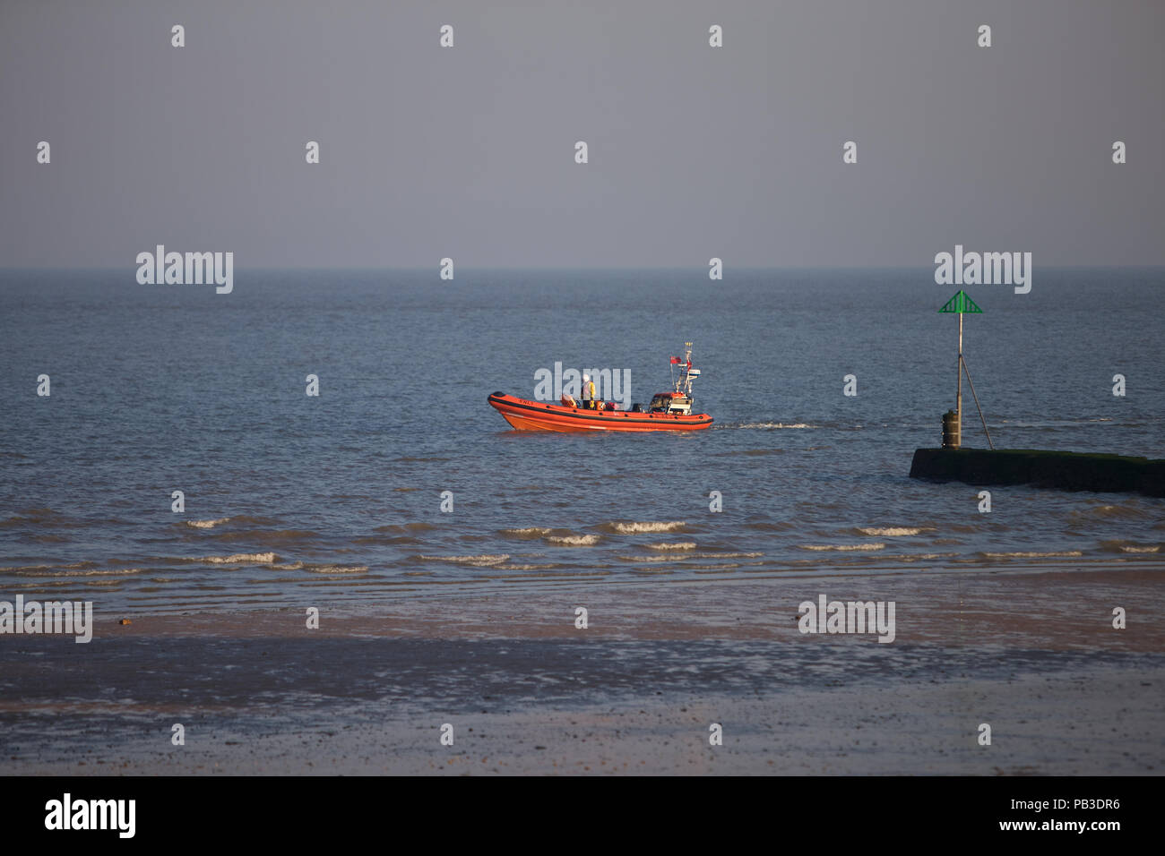 Clacton on Sea, UK. 26th July 2018. Rescue operation at Clacton on Sea, looking for a boy who has gone missing at sea. The Coastguard was called at 6.20pm this evening after two boys got into trouble in the water. Credit: Del Anson/Alamy Live News Stock Photo