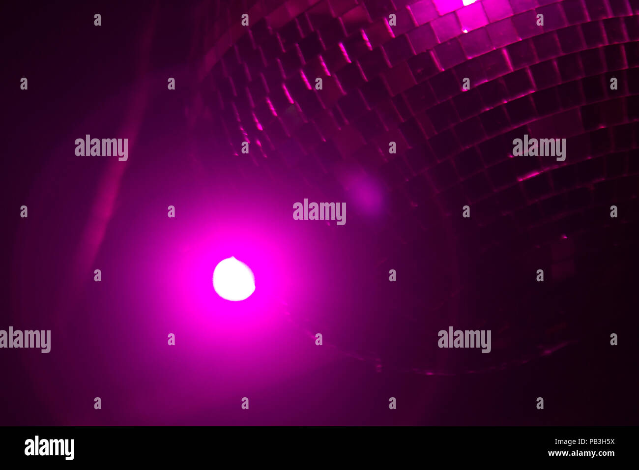 Wallpaper Background Of Sparkling Disco Ball Illuminated By A Pink Laser Light At A Party No People Stock Photo Alamy