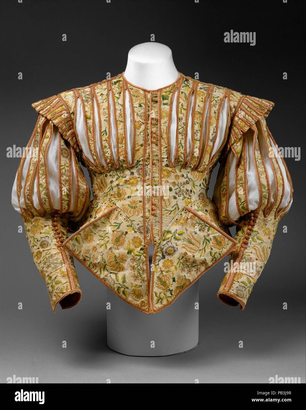 Doublet. Culture: French. Date: early 1620s.  This extraordinary doublet is one of only two surviving examples of its type from the 1620s. The only other known doublet of this kind is in the collection of the Victoria and Albert Museum in London. Made of luxurious silk embellished with pinking and decorative slits, this doublet followed a fashion that existed barely five years. Pinking, or the intentional slashing of fabric, was a popular decorative technique used to reveal colorful linings, shirts, and chemises. It is possible that this garment was constructed from silk previously pinked for  Stock Photo