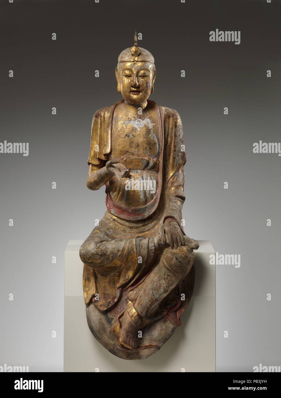 Bodhisattva. Culture: China. Dimensions: H. 49 1/2 in. (125.7 cm); W. 18 1/4 in. (46.4 cm). Date: 16th-17th century. Museum: Metropolitan Museum of Art, New York, USA. Stock Photo