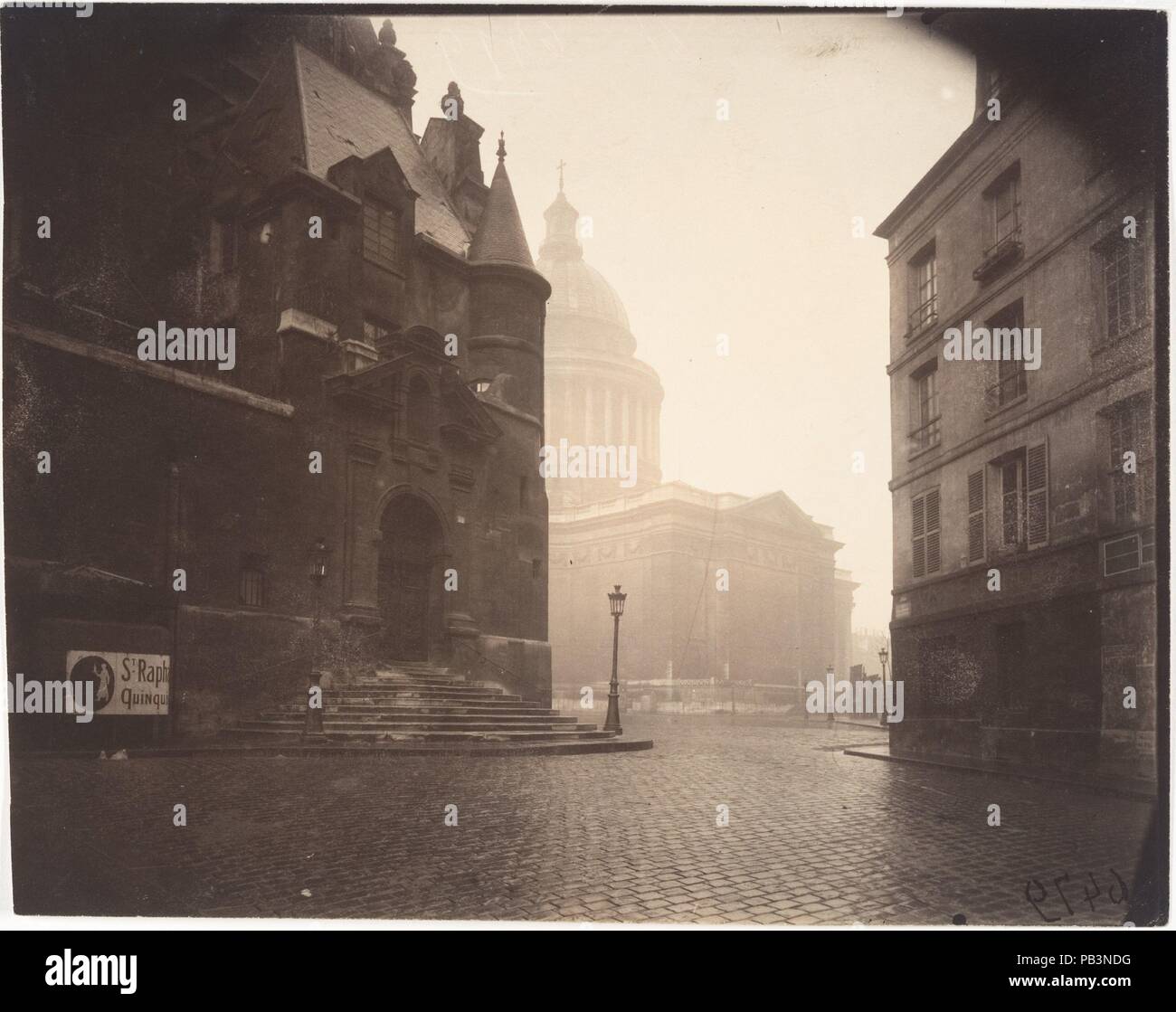 Rue de la Montagne-Sainte-Geneviève. Artist: Eugène Atget (French, Libourne 1857-1927 Paris). Dimensions: Image: 17.4 x 22.1 cm (6 7/8 x 8 11/16 in.)  Sheet: 17.7 × 22.5 cm (17.7 × 22.5 cm). Date: 1924.  In his early work, Atget often photographed in full midday sun so that his 'documents' would record all the details of architectural or ornamental subjects. In his late work, such as this view of the Pantheon, he often photographed in the early morning, when the absence of people and the presence of a softly luminous light suffused his scenes with quietude. The photograph is clearly an evocati Stock Photo