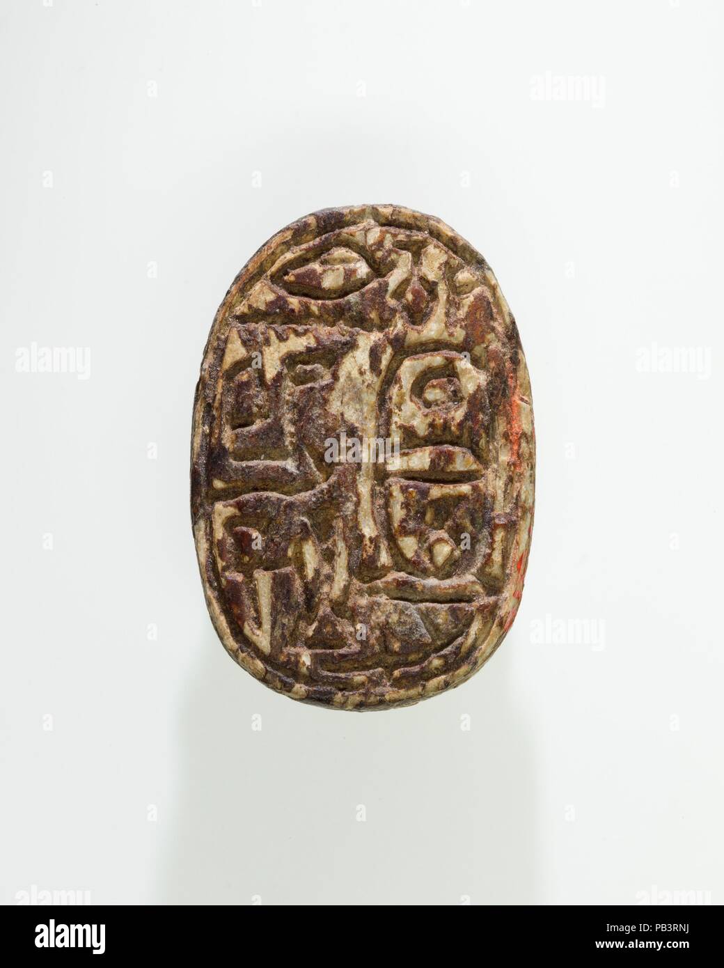 Scarab of Sebekhotep IV. Dimensions: L. 2.4 × W. 1.6 × H. 1 cm (15/16 × 5/8 × 3/8 in.). Dynasty: Dynasty 13-17. Date: ca. 1802-1550 B.C..  Scarab shaped seal inscribed with the prenomen and filiation of Sebekhotep IV: 'the good god Khaneferre, begotten of the god's father Ha-ankhef.'. Museum: Metropolitan Museum of Art, New York, USA. Stock Photo