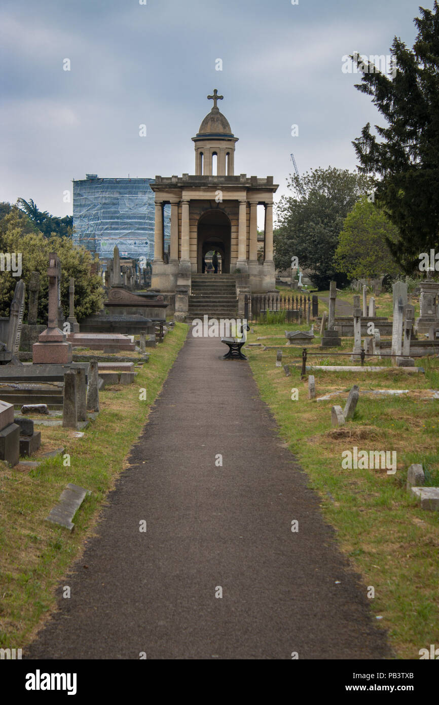 Gravestones and a chapel in Brompton Cemetary in London, England, UK, Europe. Stock Photo
