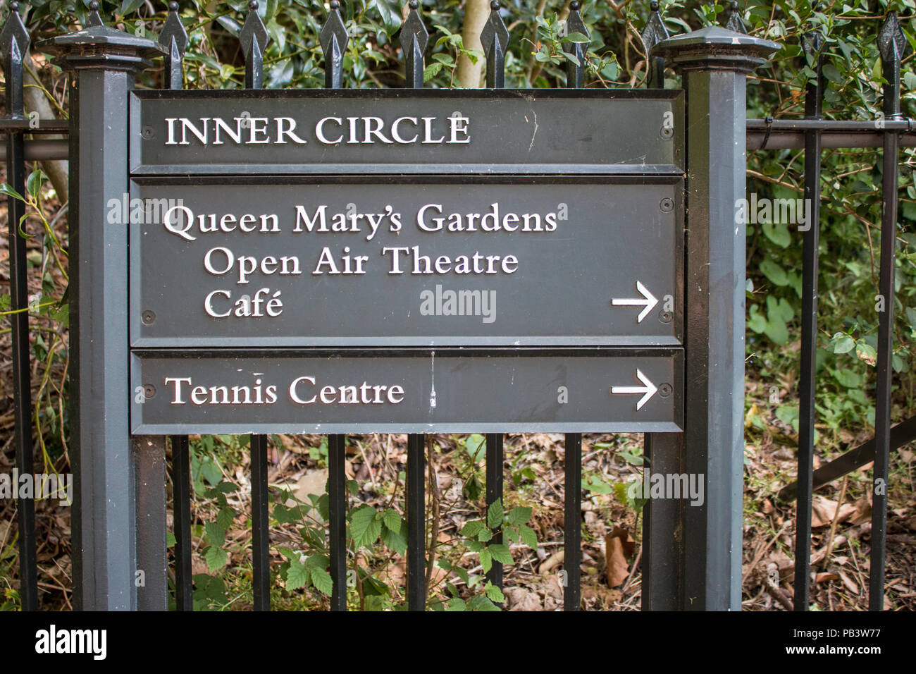 A sign in Hyde Park points to Queen Mary's Gardens and the tennis centre. Stock Photo