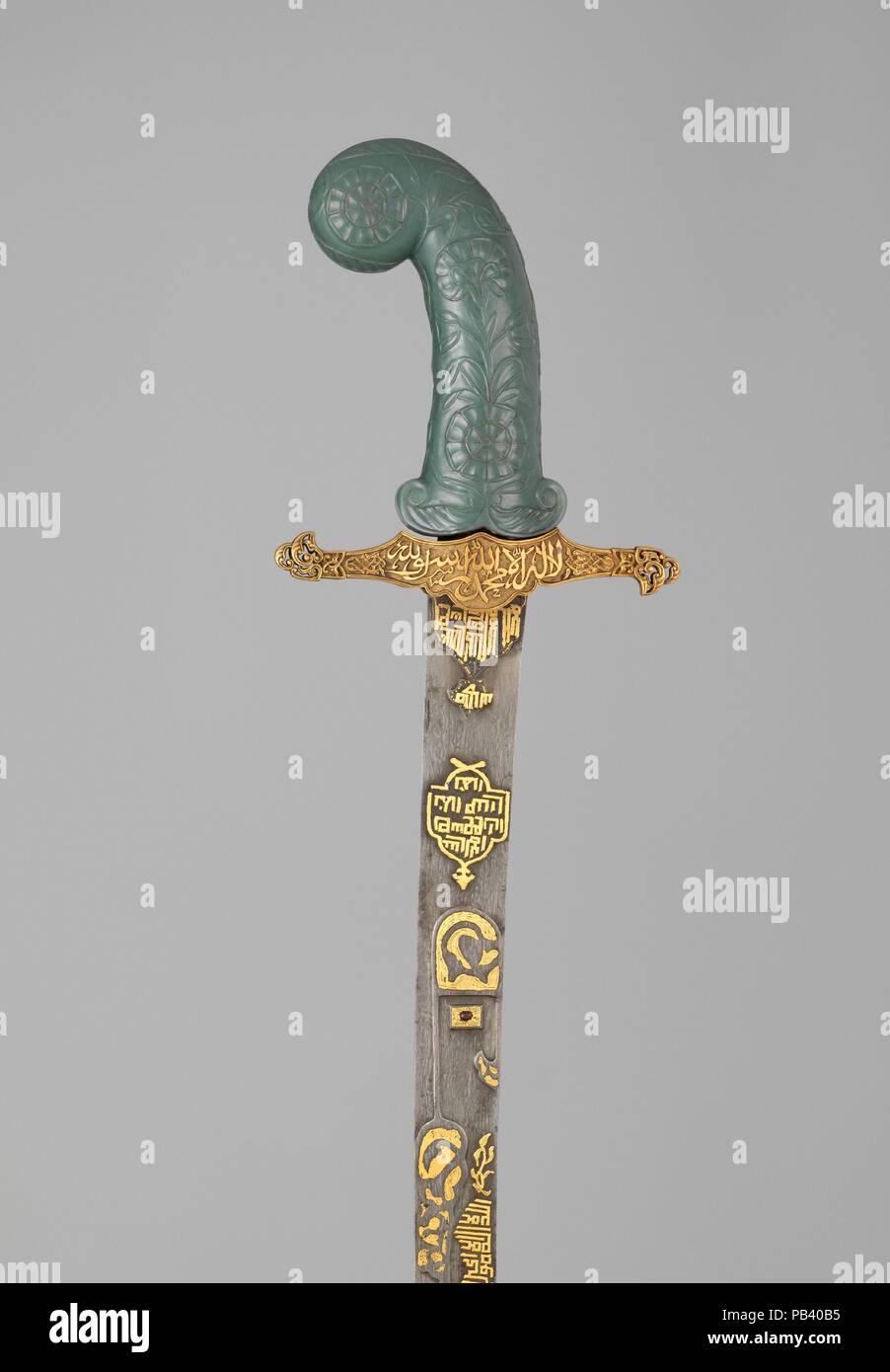 Sword (Kilij). Culture: hilt and guard, Turkish; grip, Indian. Dimensions: L. 37 5/8 in. (95.6 cm). Date: hilt and guard, 19th century; grip, possibly 18th century.  The inscriptions on the sword invokes Allah, the Prophet Muhammad, and 'Ali. On the sword's blade is the <i>Ayat al-Kursi</i> (Throne Verse, 2:255), a popular talisman throughout the Islamic world. Museum: Metropolitan Museum of Art, New York, USA. Stock Photo