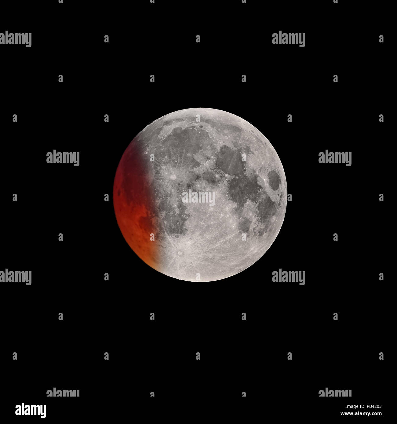 Initial phase of Super Bloody Moon full eclipse Stock Photo