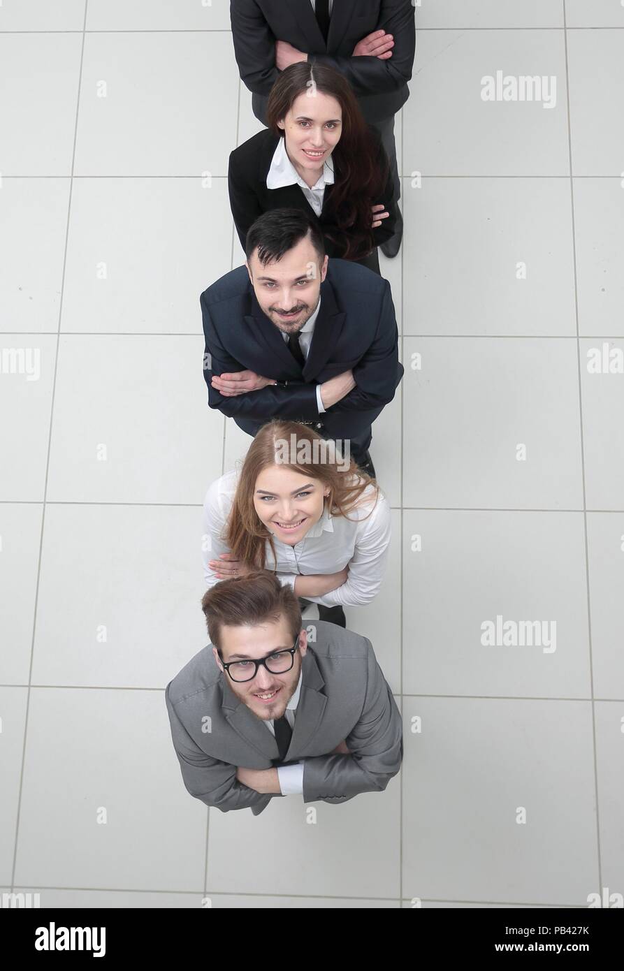 business team standing in a column on a white background Stock Photo ...
