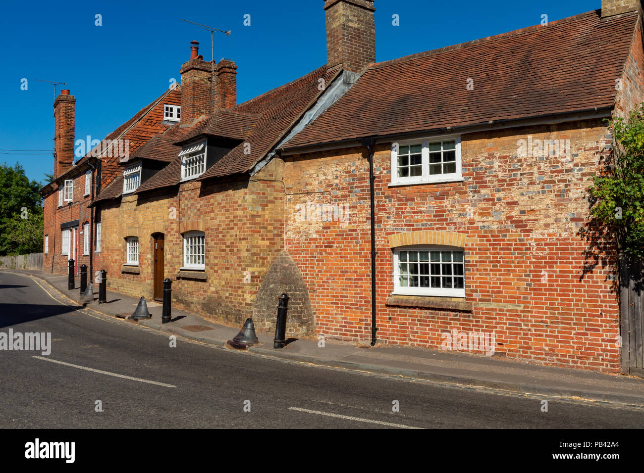 Beaulieu Hampshire England July 23, 2018 Old bric houses in a village street Stock Photo