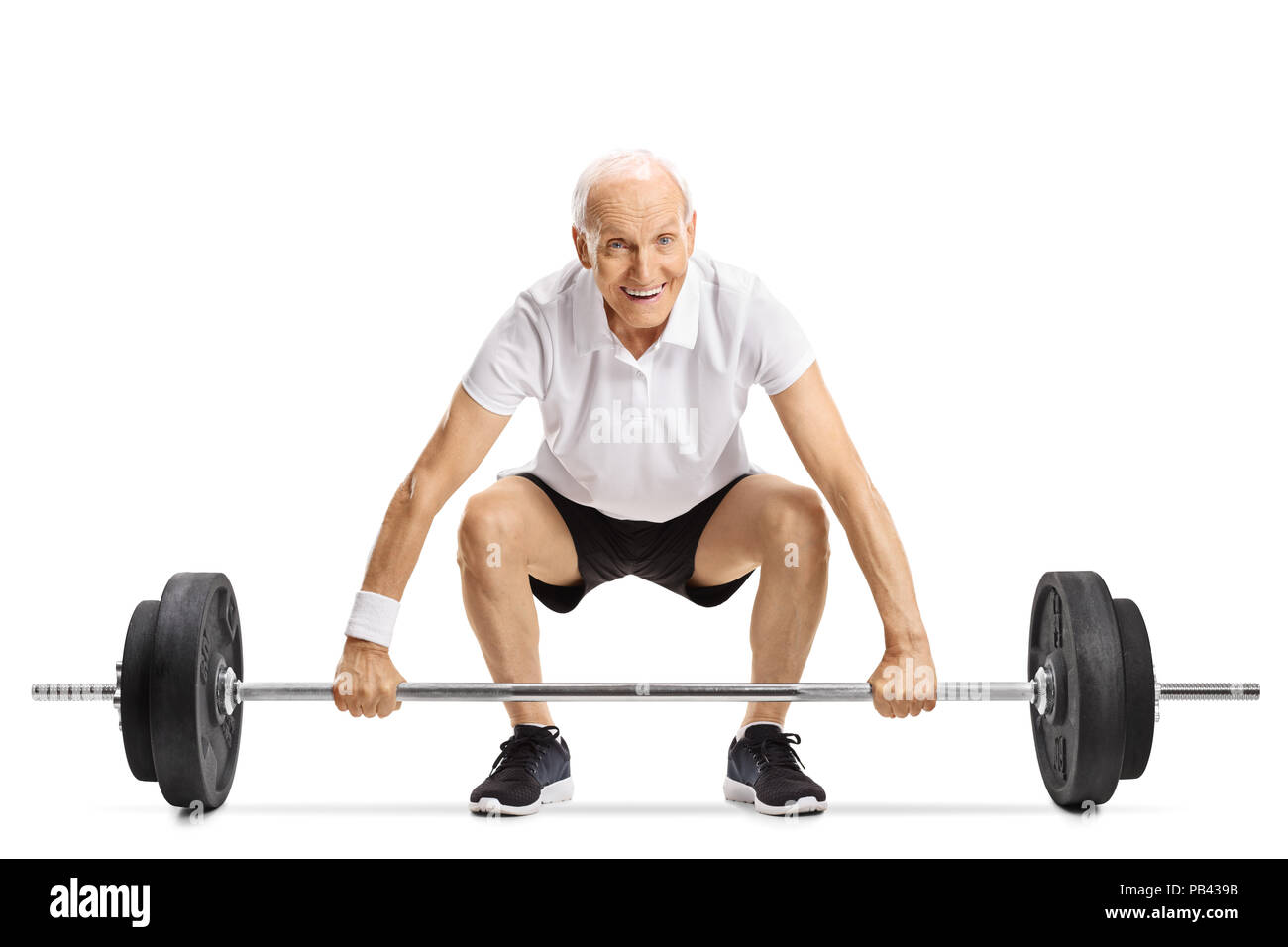 Senior lifting a barbell isolated on white background Stock Photo
