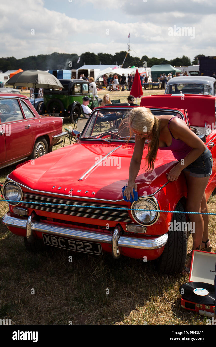 An immaculate Triumph Herald taking part in the classic car display at the 2018 Cheshire Steam Fair Stock Photo