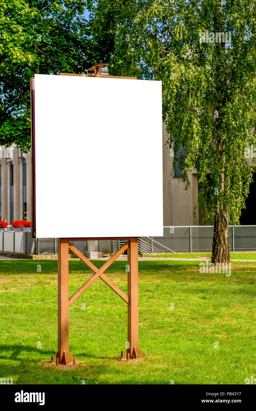 Mock up. Outdoor advertising, blank billboard outdoors, public information board in the park Stock Photo