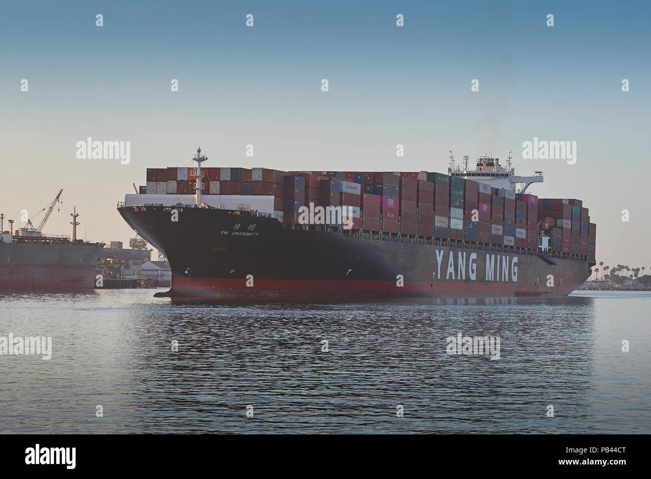 The Giant YANG MING Container Ship, YM UNANIMITY, Enters The Los Angeles Main Channel, Bound For The Port Of Los Angeles, California, USA. Stock Photo