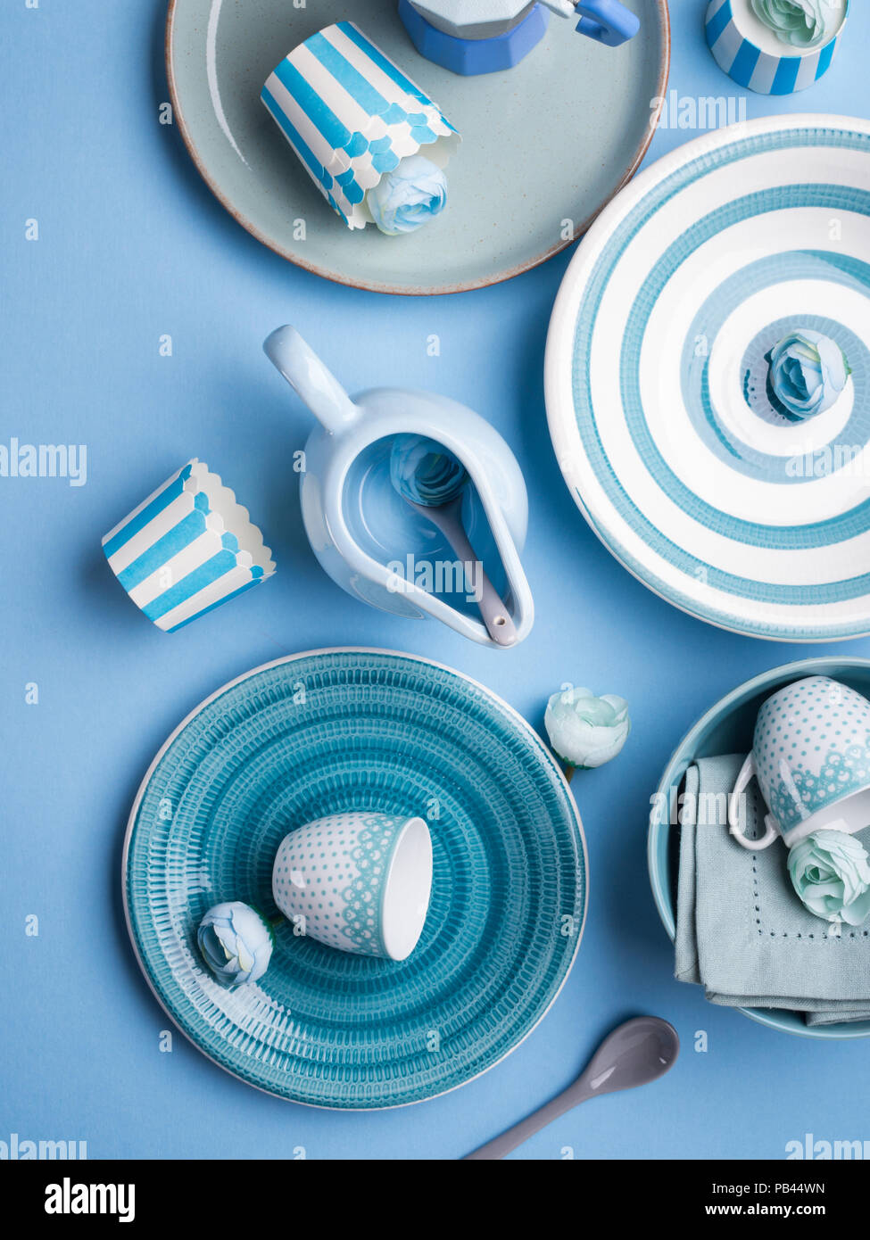 Blue pastel ceramic tableware crockery set on abstract background Stock  Photo - Alamy
