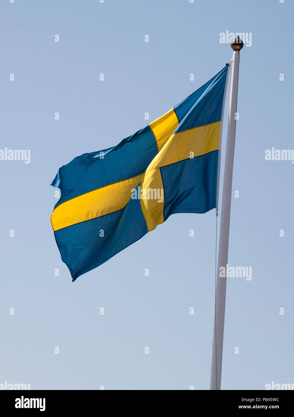 SWEDISH FLAG on pole 2018 Stock Photo