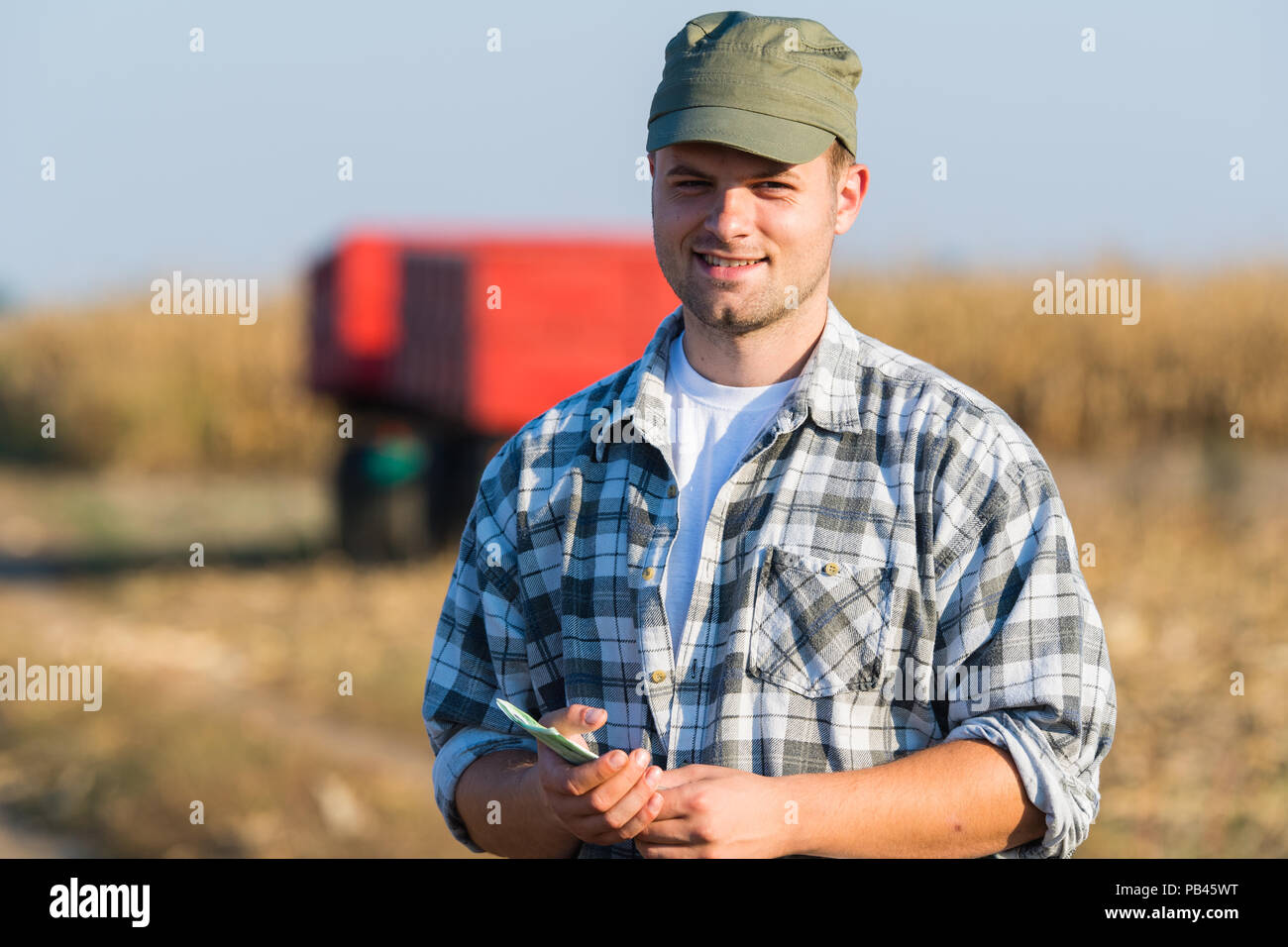 Businessman standing grain field hi-res stock photography and images ...