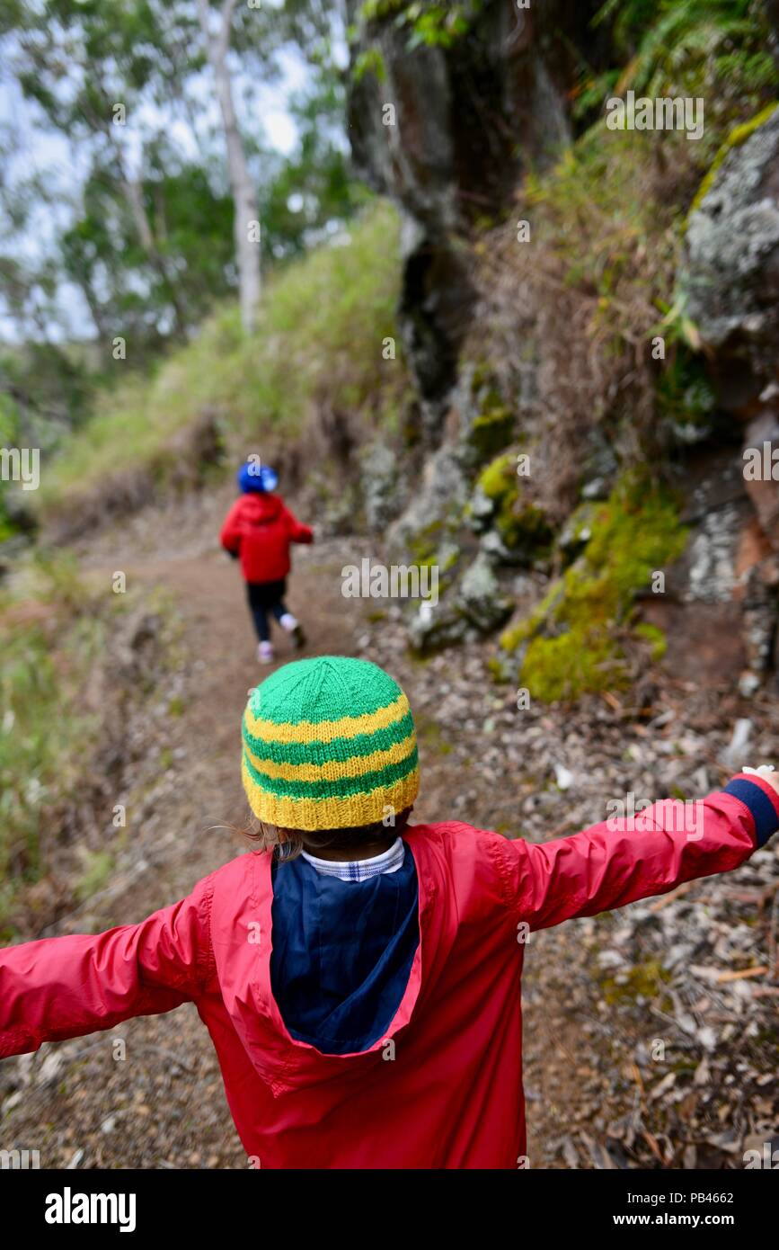 Children walking down the path to Little millstream falls, Millstream