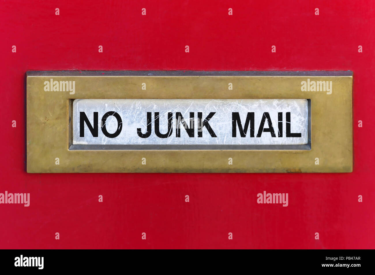 Door with a no junk mail slot Stock Photo Alamy