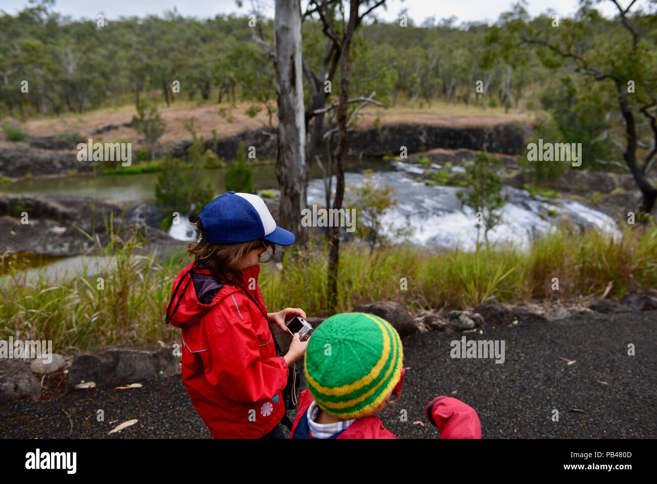 Children walking on the walking path to Big Millstream Falls