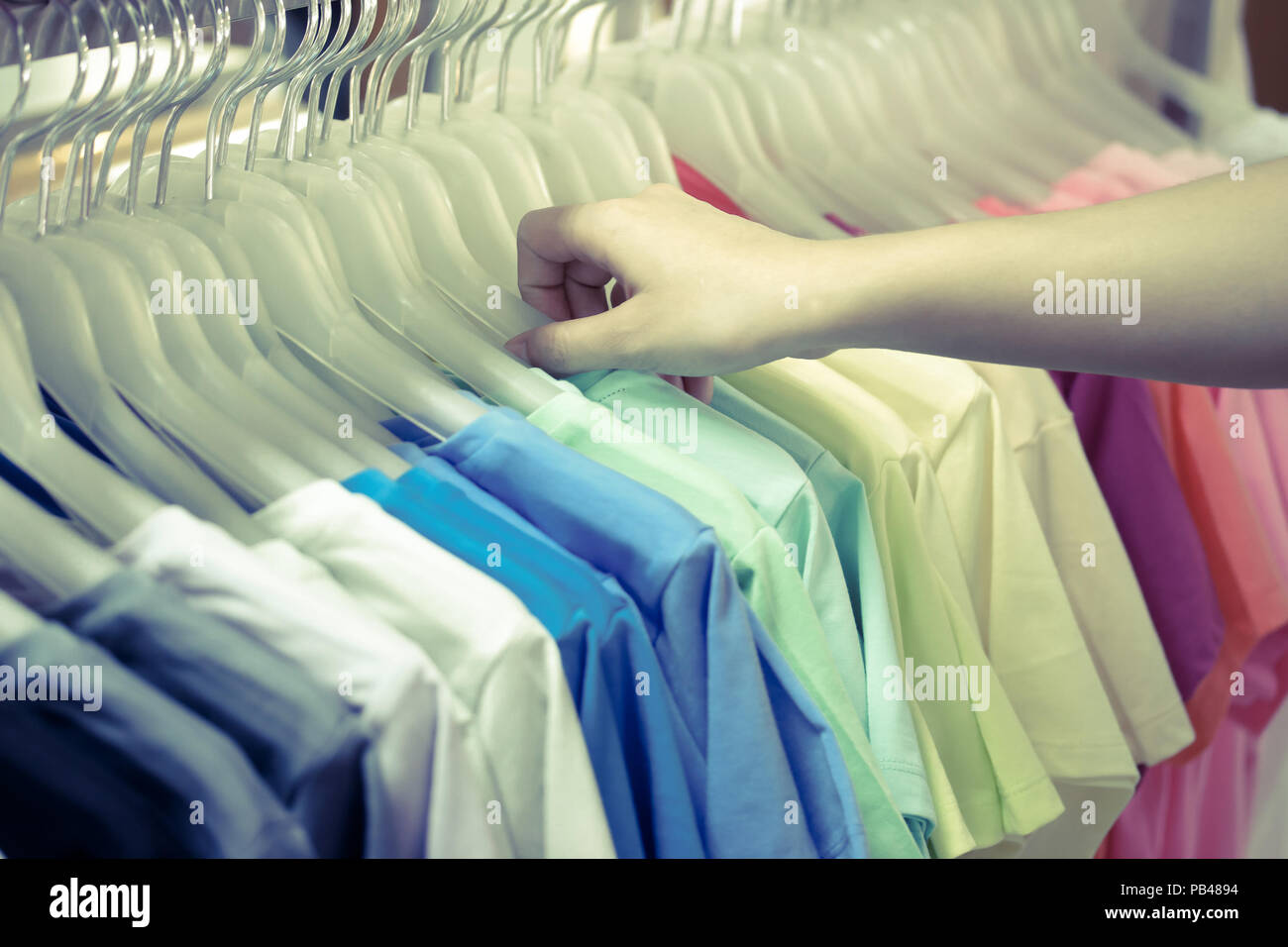 Colorful t-shirt on hangers -  vintage effect Stock Photo