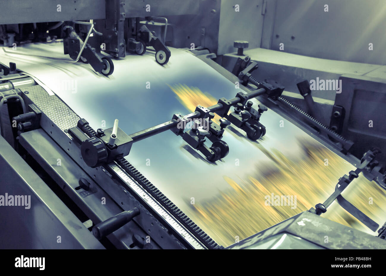 process in a modern printing house vintage filter Stock Photo Alamy