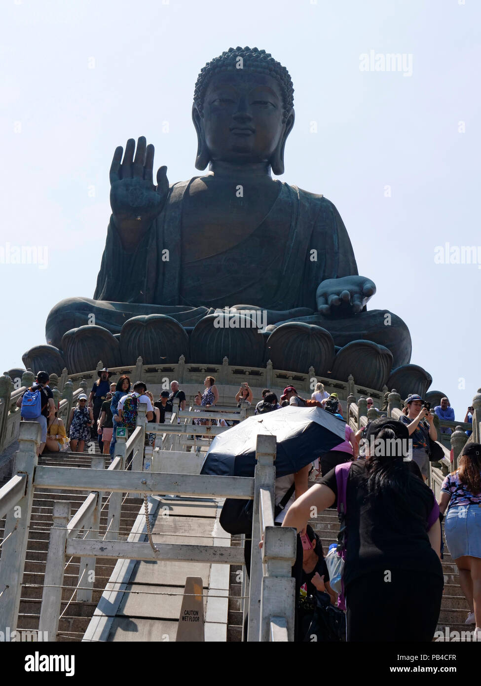 Bronze statues at Tian Tan Buddha, (Big Buddha) near the Buddhist Po Lin Monastery, Ngong Ping, Lantau Island, Hong Kong Stock Photo