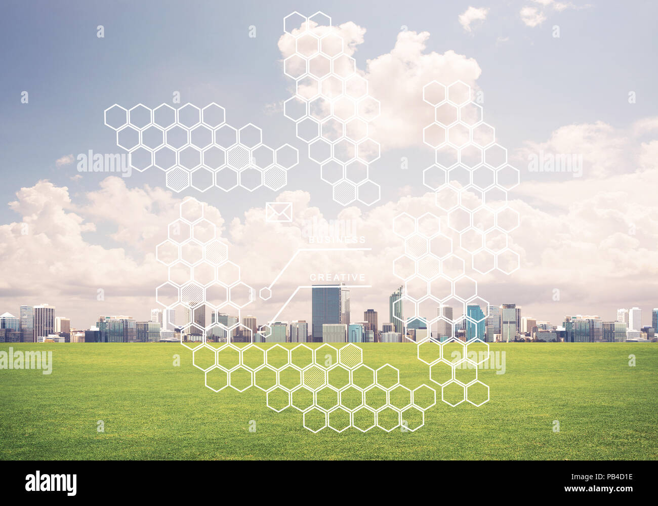 Natural background with modern cityscape green field and media i Stock