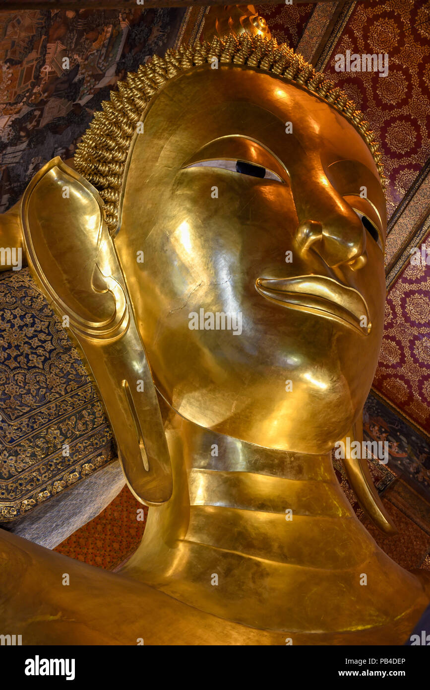 Big golden reclining Buddha of Wat Pho temple in Bangkok, Thailand ...