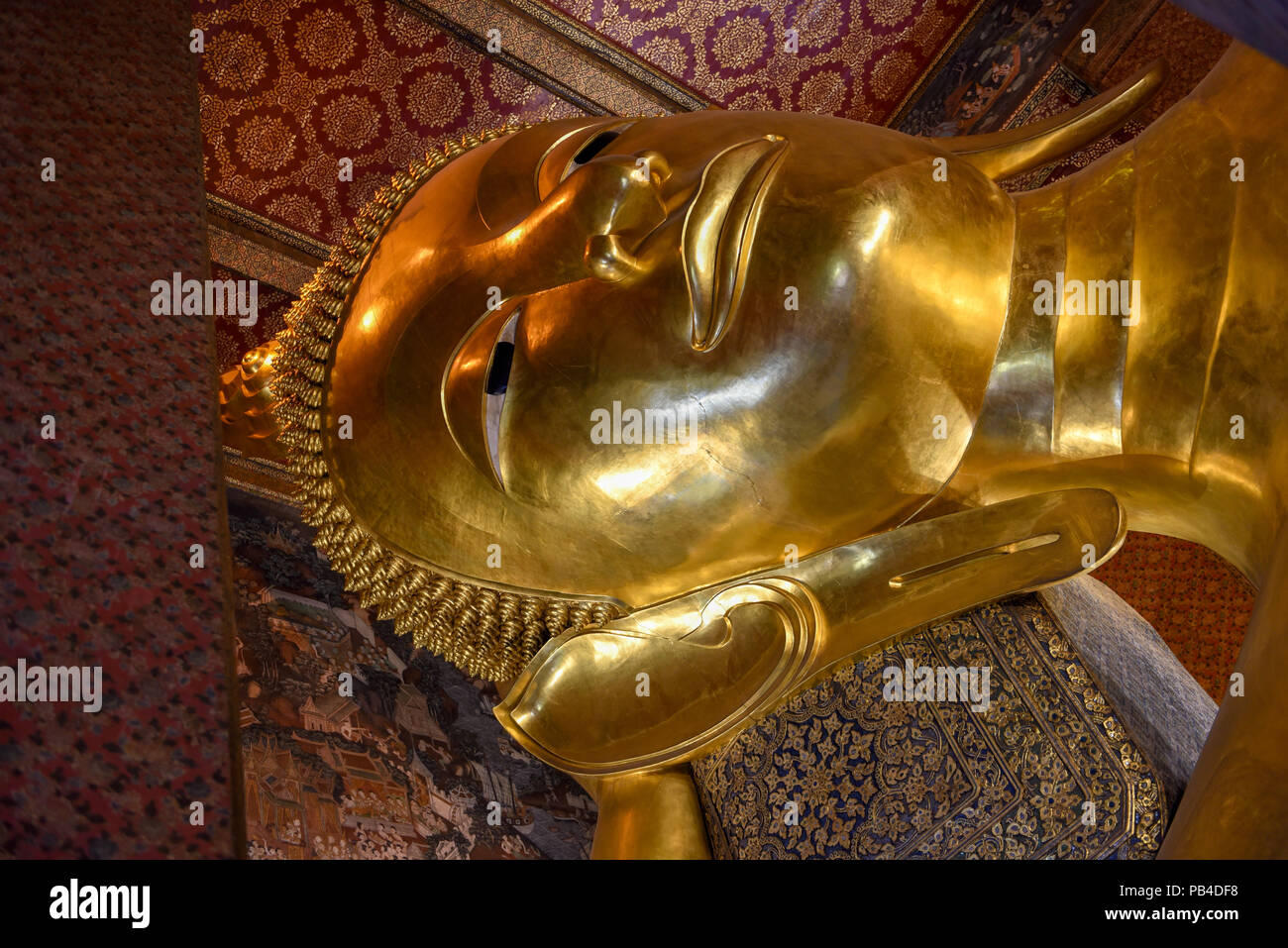 Big golden reclining Buddha of Wat Pho temple in Bangkok, Thailand ...