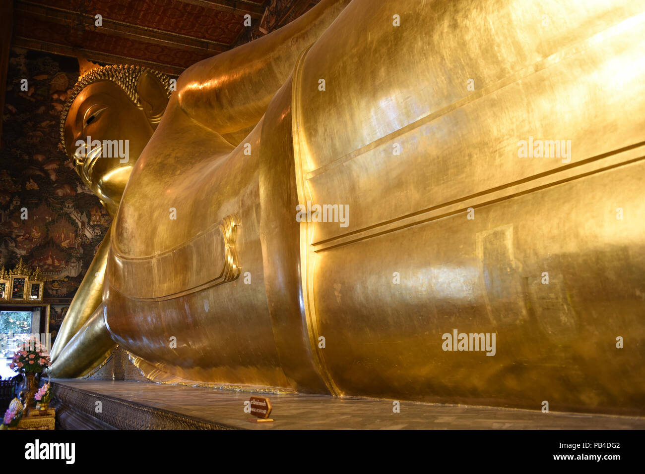 Big golden reclining Buddha of Wat Pho temple in Bangkok, Thailand ...