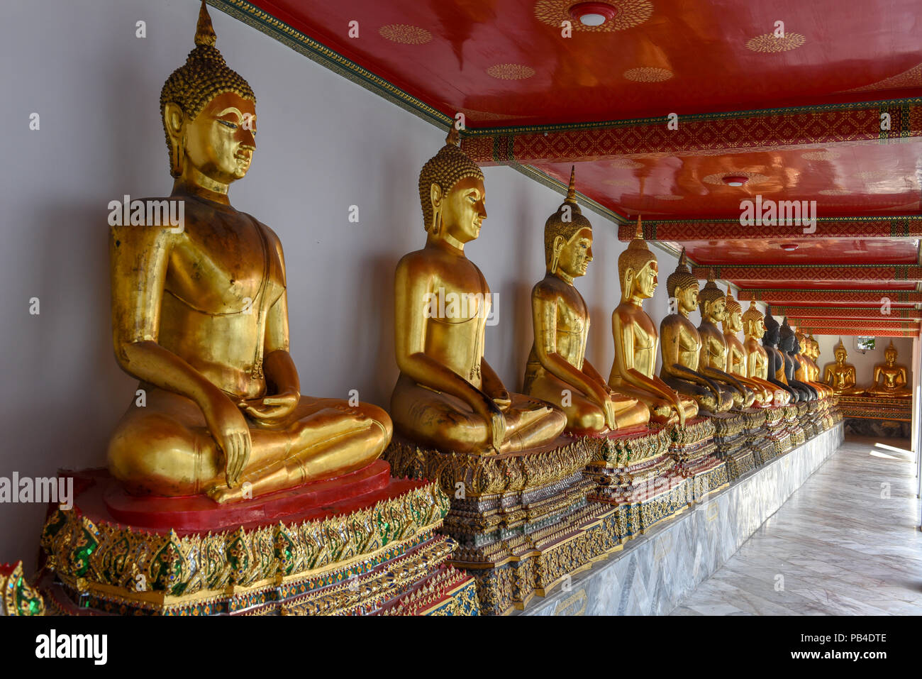 Golden Buddha of Wat Pho temple in Bangkok, Thailand Stock Photo - Alamy