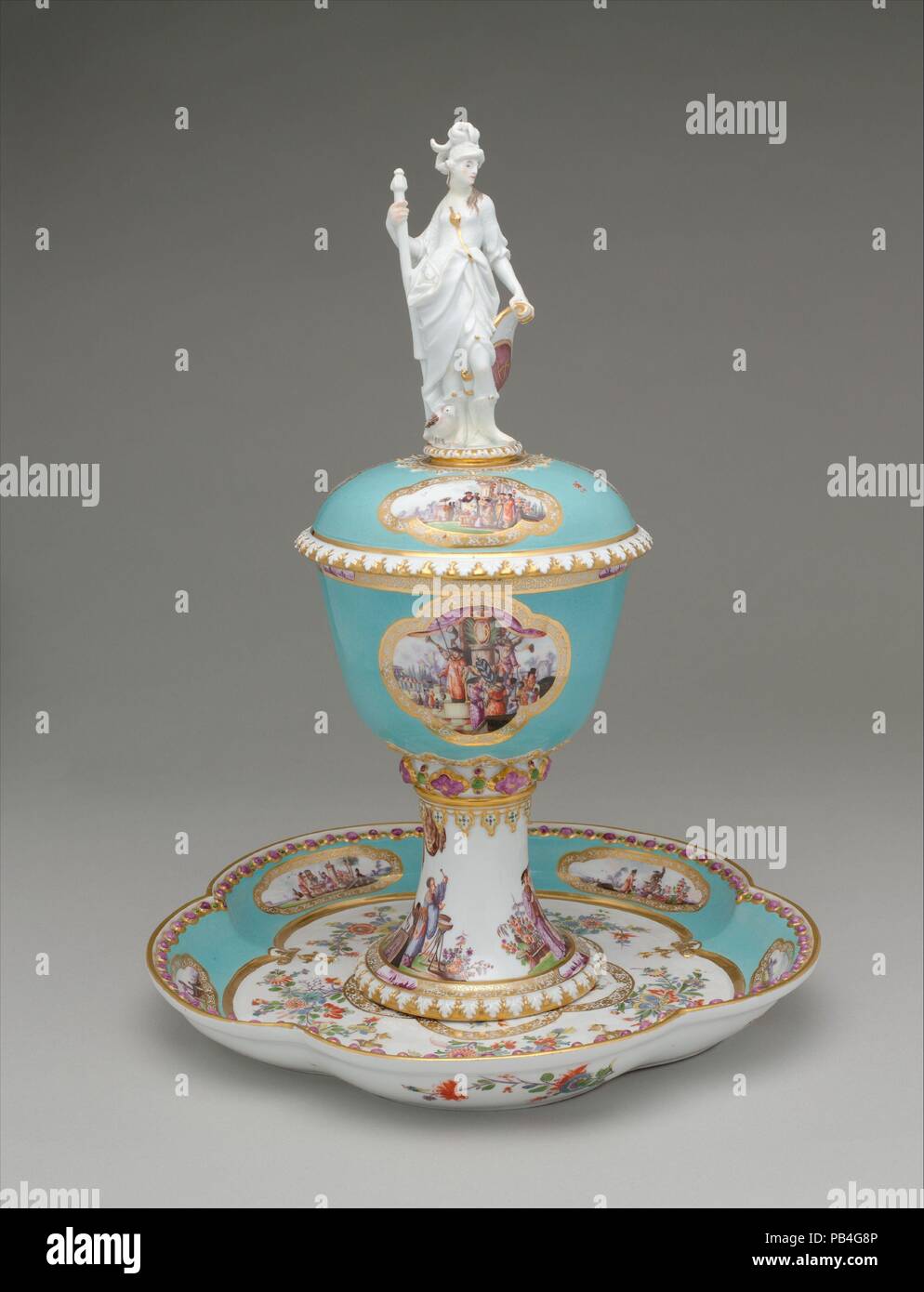 Standing cup with cover and stand. Culture: German, Meissen. Dimensions: Overall, cup: 15 1/2 x 6 1/4 in. (39.4 x 15.9 cm); Overall, stand: 1 1/2 x 11 1/2 in. (3.8 x 29.2 cm). Factory: Meissen Manufactory (German, 1710-present). Modeler: Johann Joachim Kändler (German, Fischbach 1706-1775 Meissen). Date: ca. 1735.  Commissioned by Augustus the Strong, Elector of Saxony and King of Poland, to commemorate the state visit to Dresden in January 1728 of the king and queen of Prussia, parents of Frederick the Great. The queen's initials, SD for Sophie-Dorothea, are three times displayed. The larger  Stock Photo