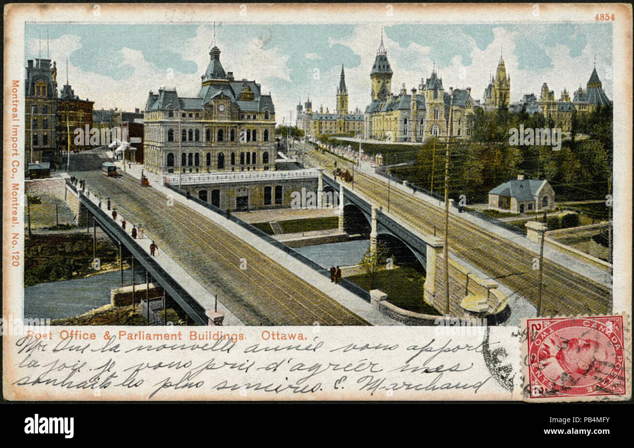 . English: Post Office Ottawa and Sappers Bridge and Dufferin Bridge with Parliament Buildings. Hand color postcard that was mailed on 3 January 1905 so this depiction predates that date. Original photograph is in PAC and was by Topley and it is dated 1890-1895 though it was almost certainly after 1893 when Scottish Ontario Chambers were built . between 1893 and 1905 1221 Post Office Ottawa and Sappers Bridge and Dufferin Bridge Stock Photo
