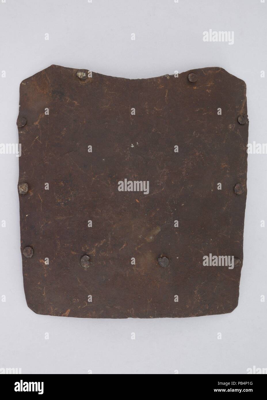 Brigandine Plate. Culture: Italian. Dimensions: H. 8 in. (20.3 cm); W. 7 1/4 in. (18.4 cm); Wt. 1 lb. 3.9 oz. (564.2 g). Date: 1400-1450. Museum: Metropolitan Museum of Art, New York, USA. Stock Photo