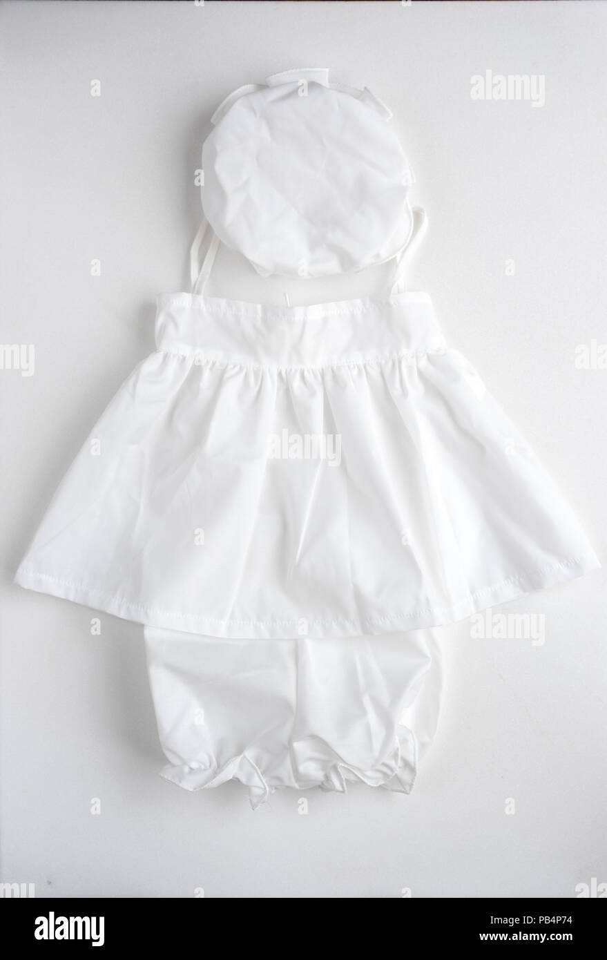 Baby clothes for baptism Stock Photo Alamy